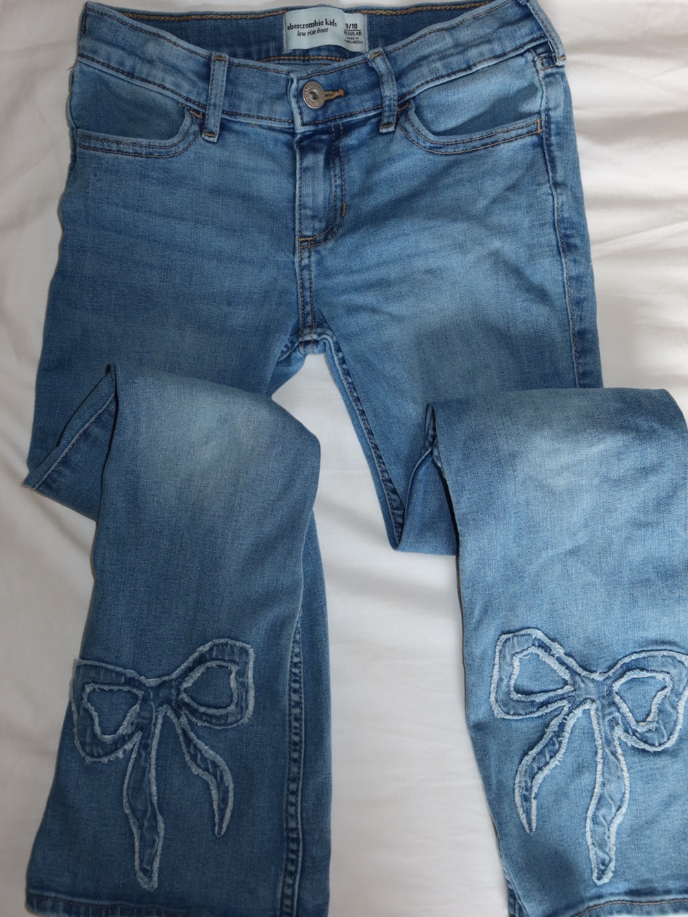 Girls Abercrombie Jeans 
Bow detailing 
Size 9-10
